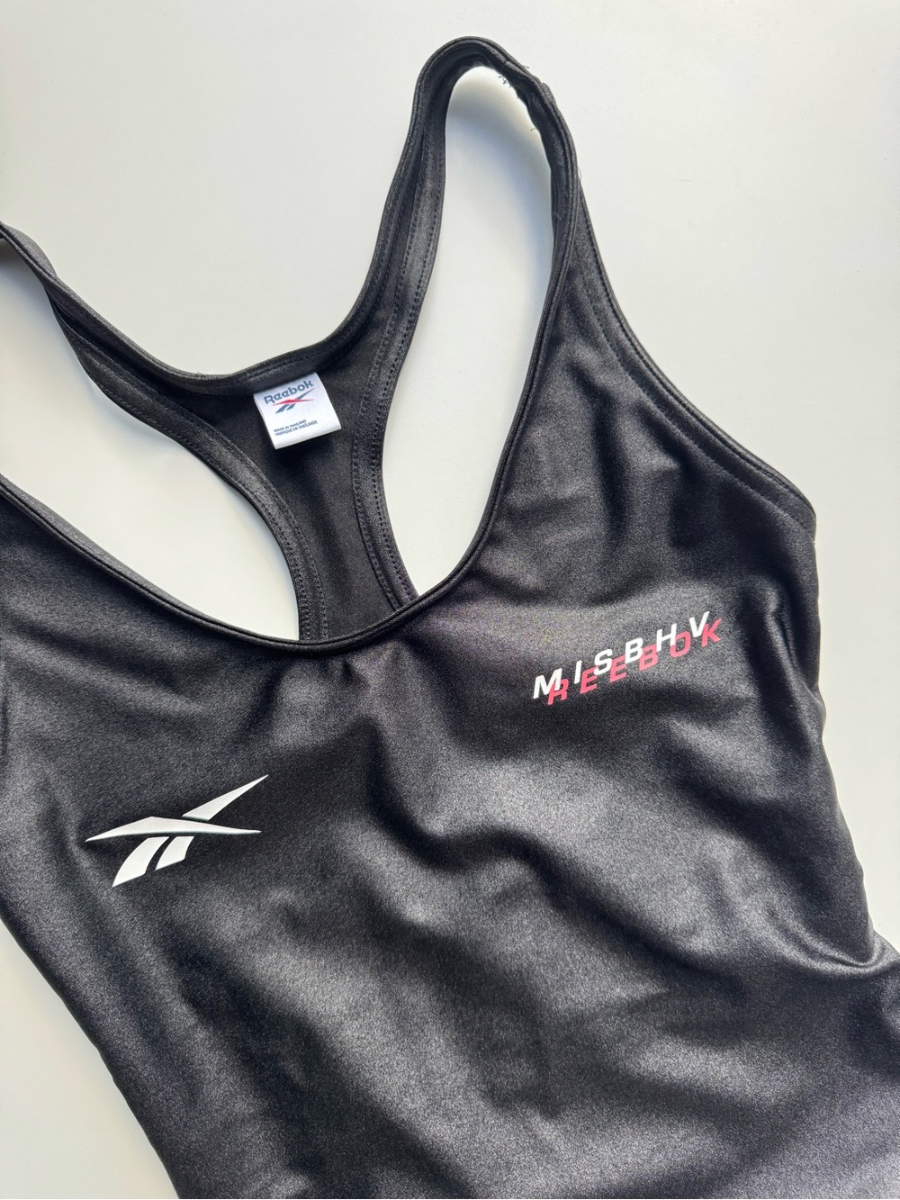 Reebok Black Racerback Bodysuit with White and Red Logos - Size XS